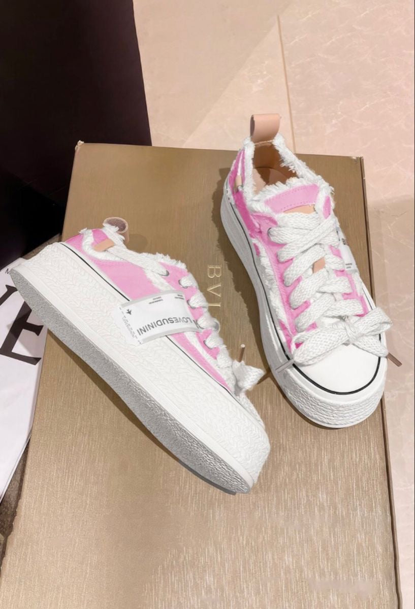 Distressed sneakers